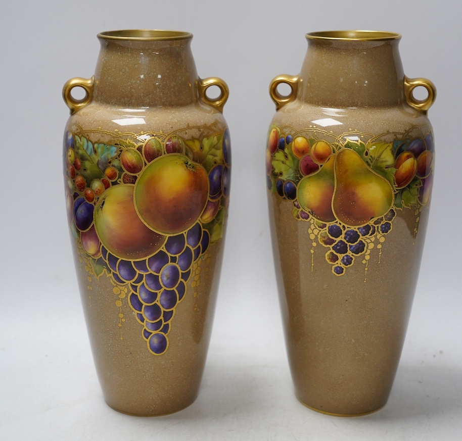 A pair of Worcester vases, decorated with fruit and berries, model number 2768, 26cm. Condition - good